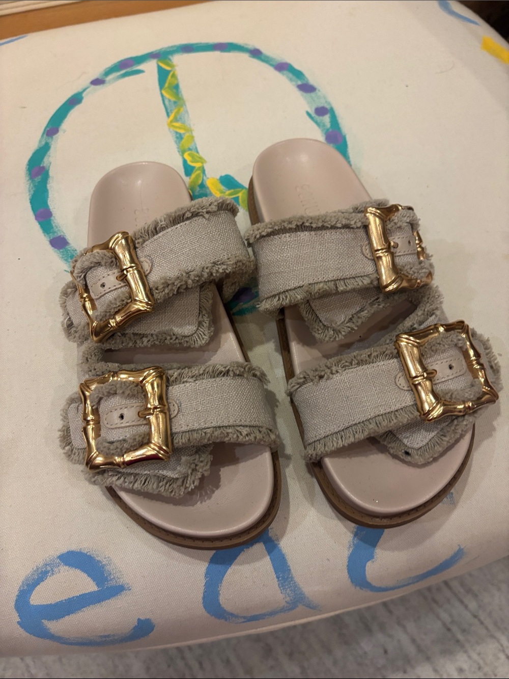SCHUTZ Beige Frayed Double-Buckle Slide Sandals with Gold Buckles